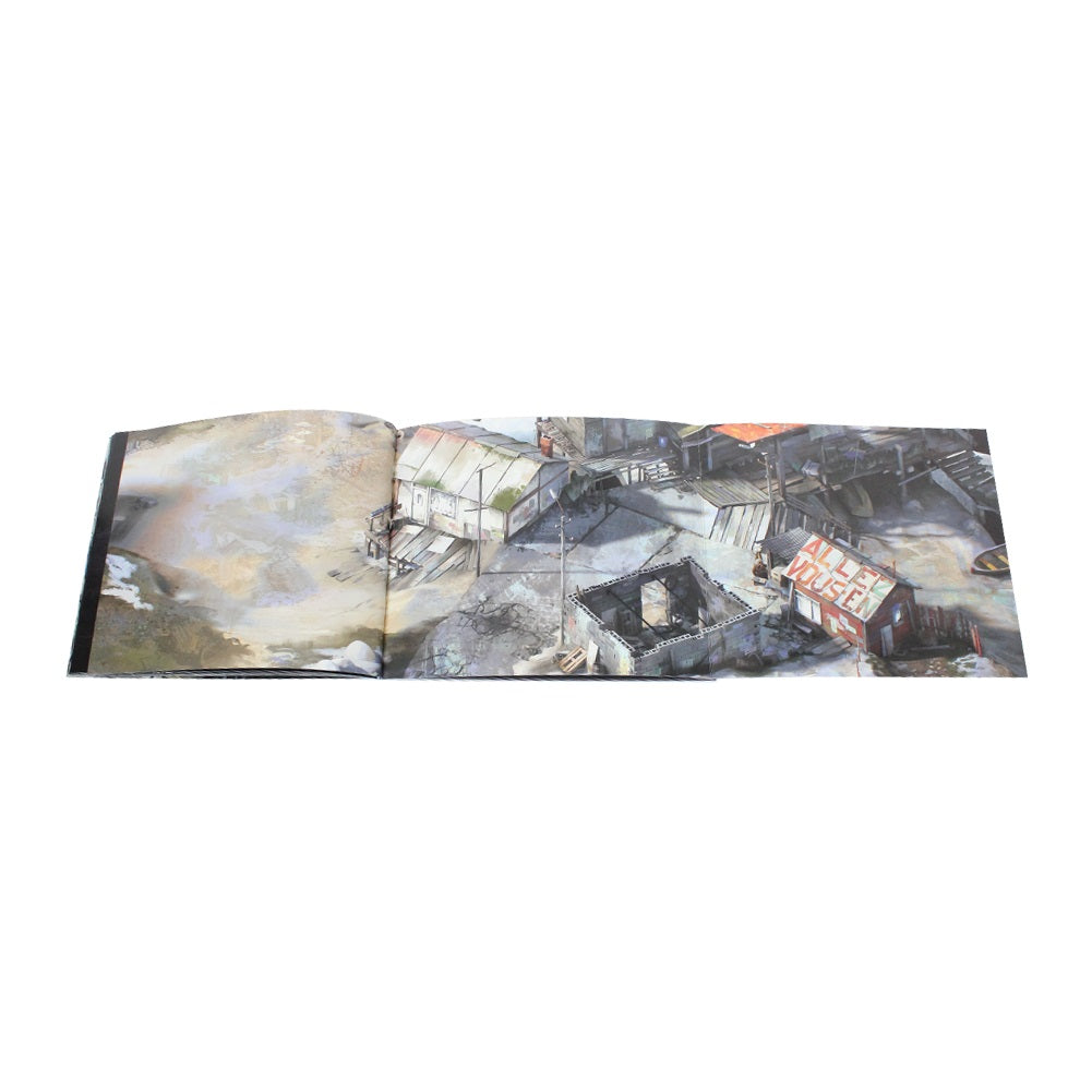 Open book or sketchbook displaying abstract artwork across its pages.